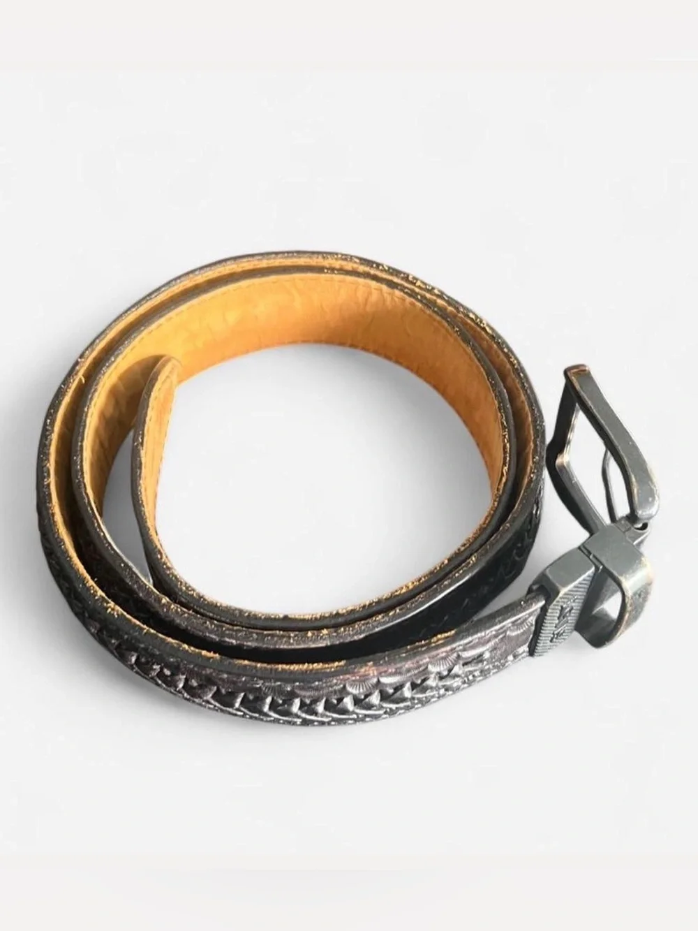 Vintage Levi's black tooled leather western belt with rotating harness buckle